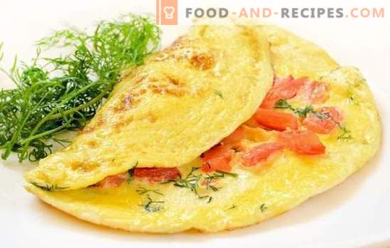 Omelet with tomatoes: traditional breakfast. Nourishing and dietary omelets with tomatoes, cheese, mushrooms, ham, pita
