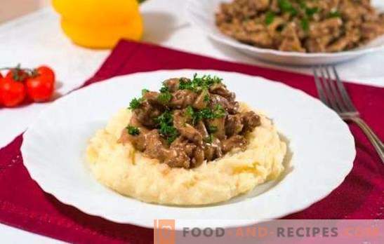 Beef stroganoff in a slow cooker - a restaurant dish. Tomato and creamy version of beef stroganoff in a slow cooker