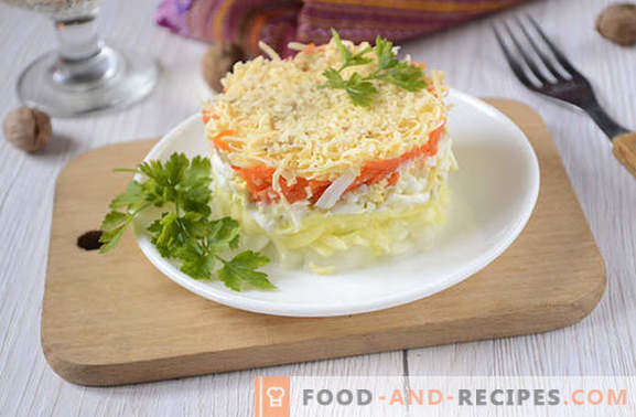 French salad with carrots: portioned, beautiful and tasty. Author's photo-recipe of step-by-step cooking salad in French with carrots, eggs, apples and nuts