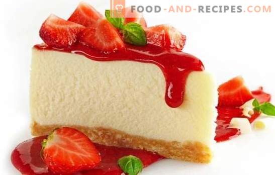 Table decoration - colorful cheesecake with strawberries. Dessert cheesecakes with strawberries: hot and cold cooking