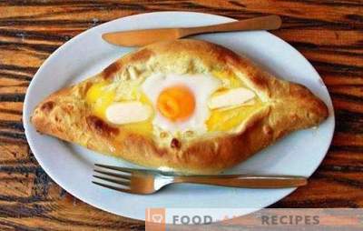 Adzhar-style Khachapuri - a hearty, boat-shaped dish. Variants of Ajarian khachapuri-boats with different types of cheese