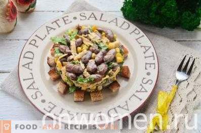 Salad with beans, crackers, corn and cheese