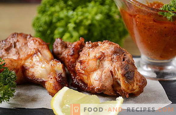 Wings in soy-tomato marinade for a juicy and fragrant kebab on the grill and in the oven