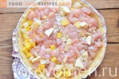 Pie with potatoes and chicken in the oven