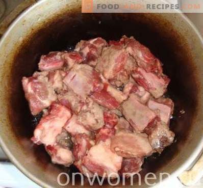 Pilaf of pork ribs in a cauldron