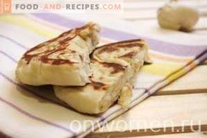 Flapjacks with onions in a pan