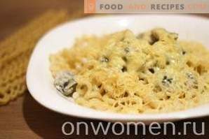 Pasta with mushrooms and cheese in cream sauce