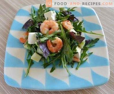 Salads with shrimps and arugula