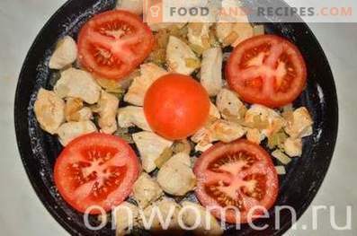Omelet with chicken and tomatoes in the oven