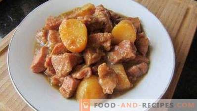 Potato stewed with pork in a pan