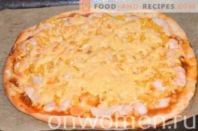 Pizza with chicken and corn on yeast dough