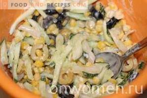 Salad with squid, corn and cucumbers