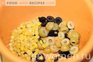 Salad with squid, corn and cucumbers