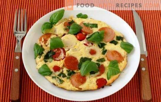 Simple omelets with tomatoes and sausage - a tradition! In the oven or in the pan - omelets with tomatoes and sausage